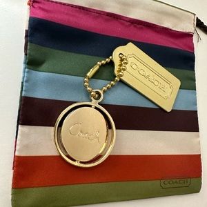 Coach Tag (gold tone)